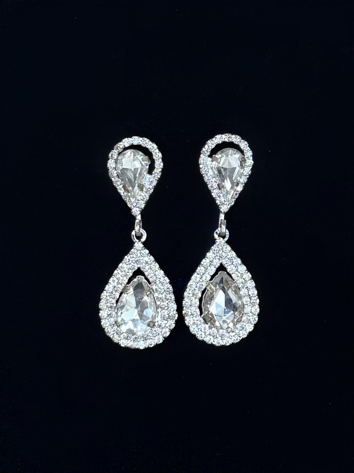 Boucles d'oreilles blanches cristal