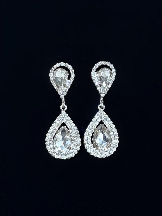 Boucles d'oreilles blanches cristal