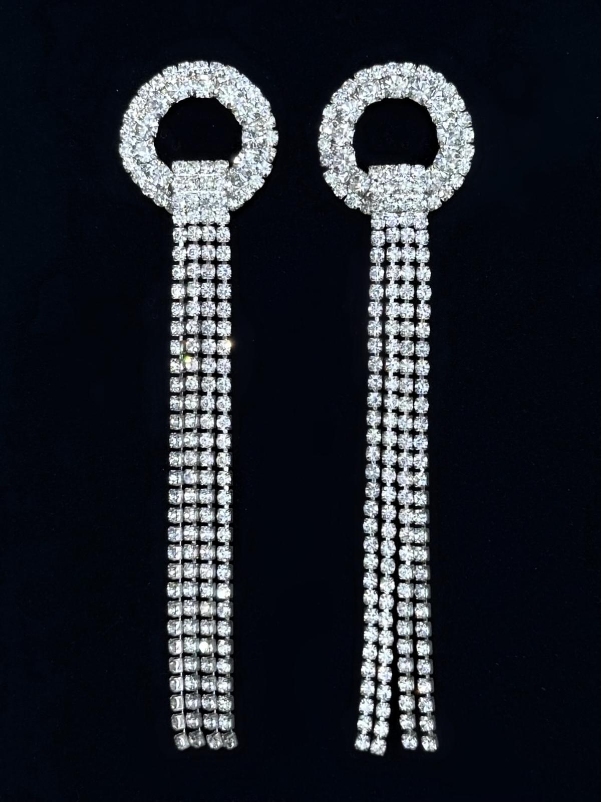 Boucles d'oreilles blanches cristal